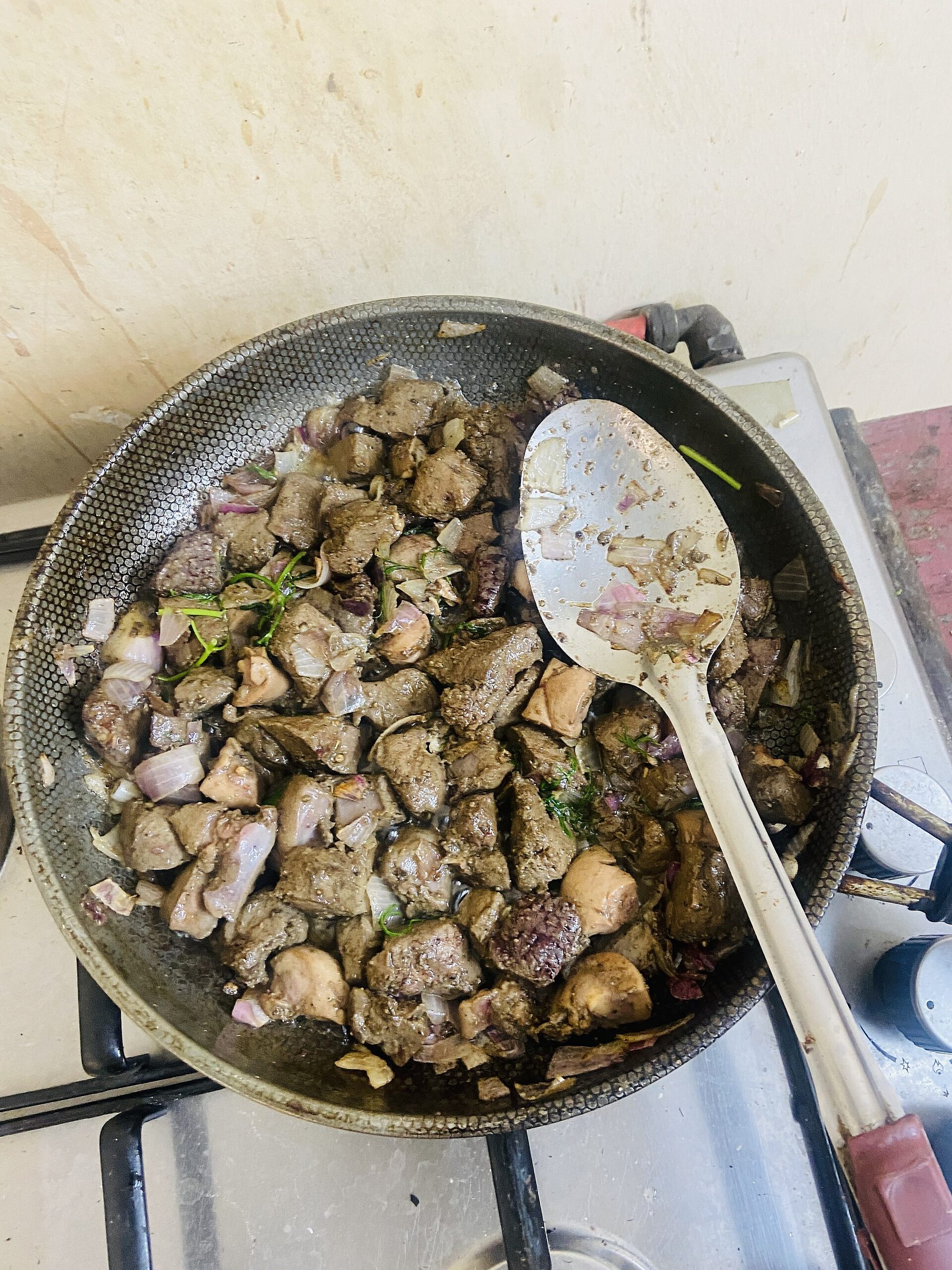 Chicken Liver — Quick-seared liver with onion, green pepper, cumin and lemon — a beloved fast dinner in Gaza.